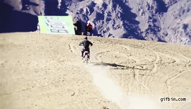 1307119572_biker_jumps_off_mountain.gif