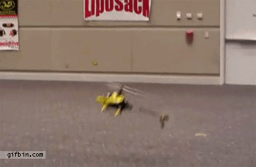 1311875809_guy_lands_rc_helicopter_on_the_wall.gif