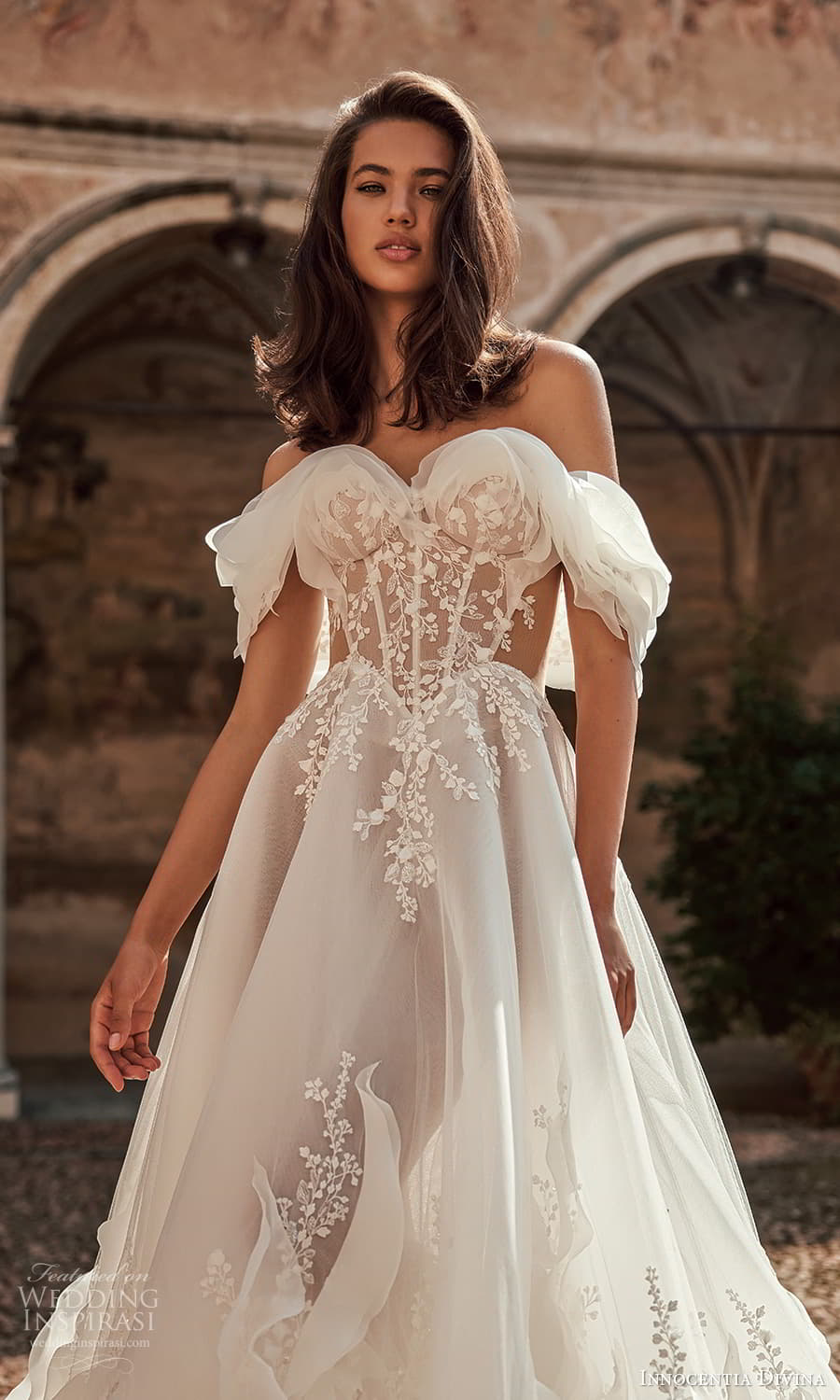 innocentia-divina-fall-2024-bridal-off-shoulder-strap-swag-sleeve-sweetheart-neckline-embelilshed-bodice-a-line-b(1).jpg