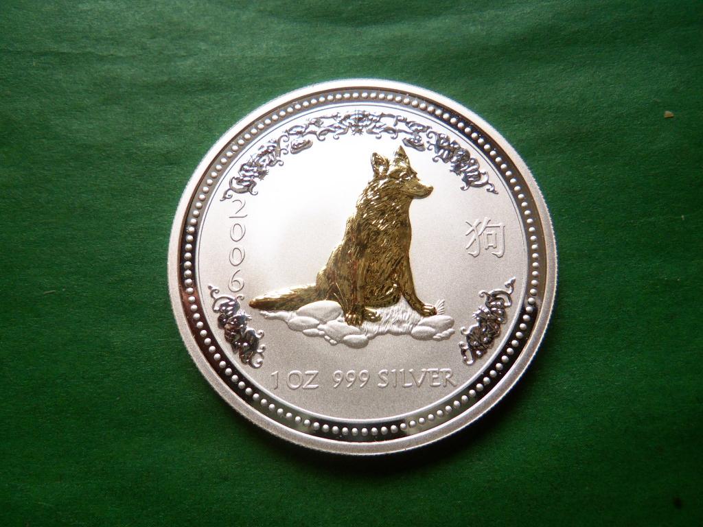avstralija_1_dollar_2006_g_god_sobaki_pozolota_serebro_unc.jpg